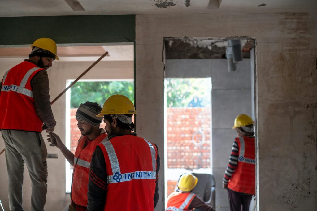 small construction company managing trades and challenges UK