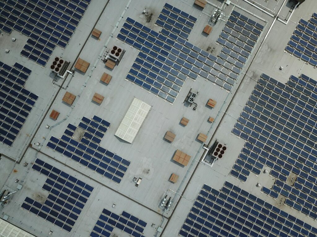 Professional solar panel installer on a rooftop in the USA