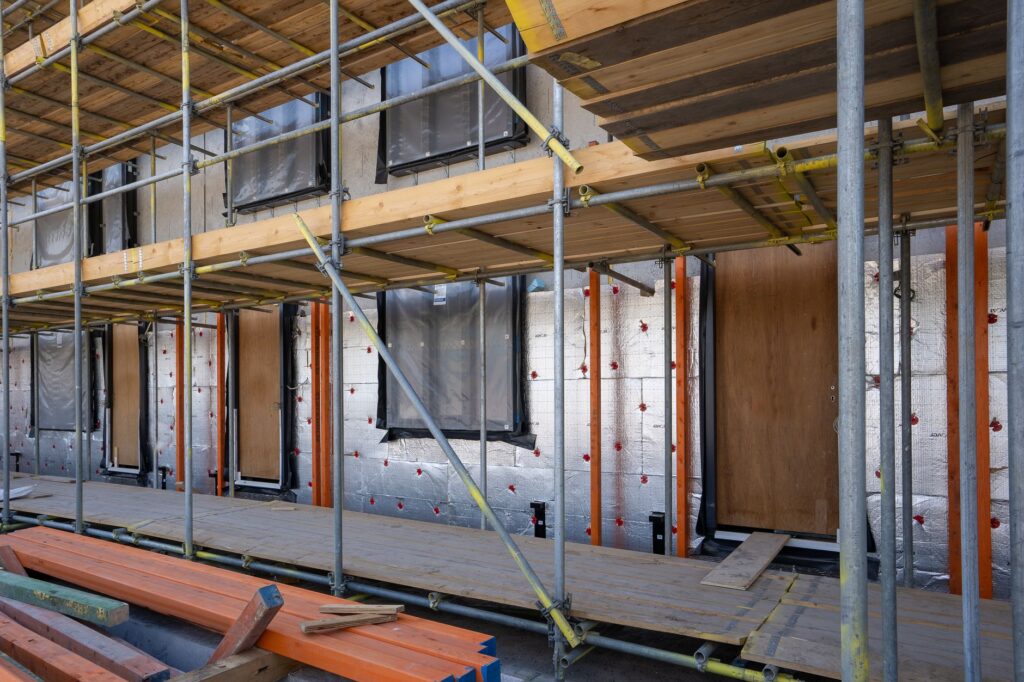 scaffolding erected on residential house for solar installation, professional setup