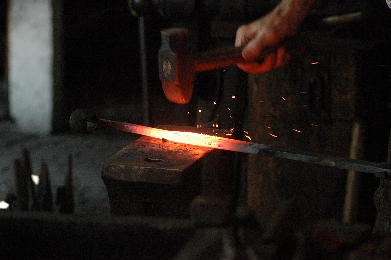 Blacksmith working hot iron — one of the oldest skilled trades