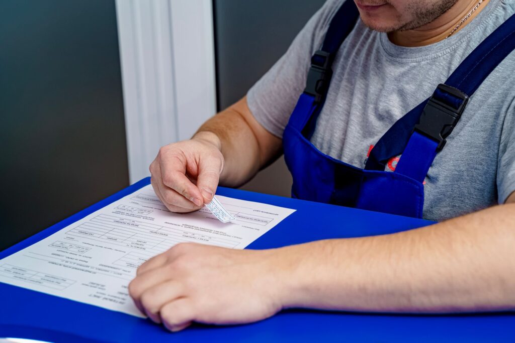 handyman reviewing licensing documents, USA