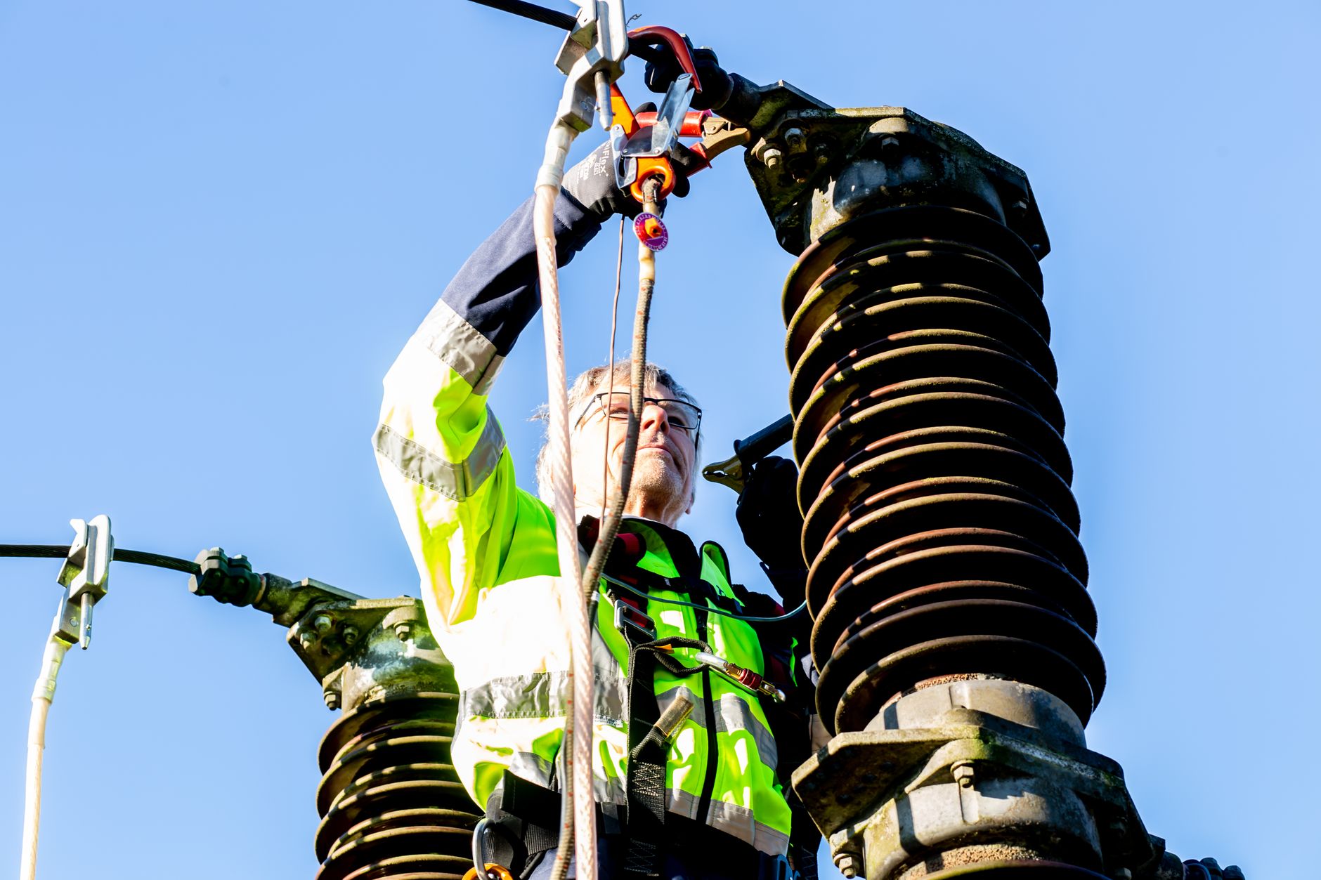 Professional electrician working on electrical installation in the USA, professional workwear