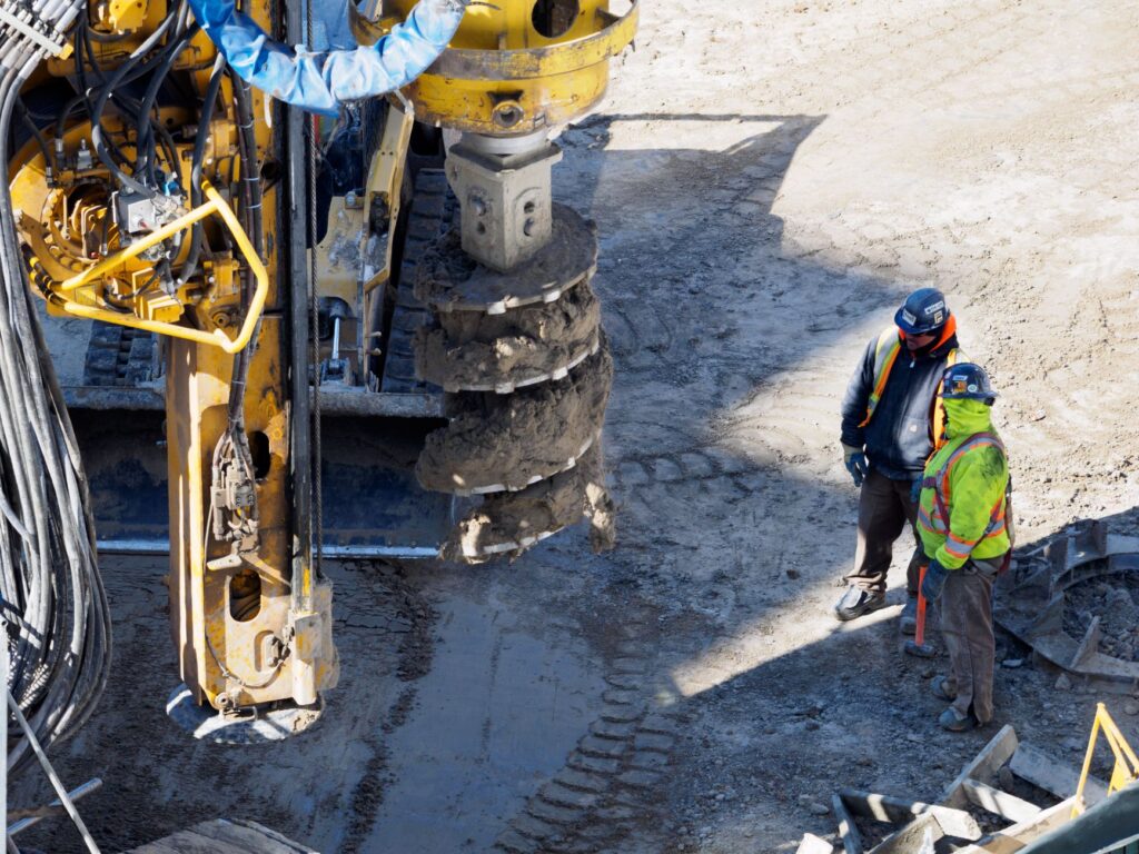 Professional groundworker's tools laid out on a job site, USA