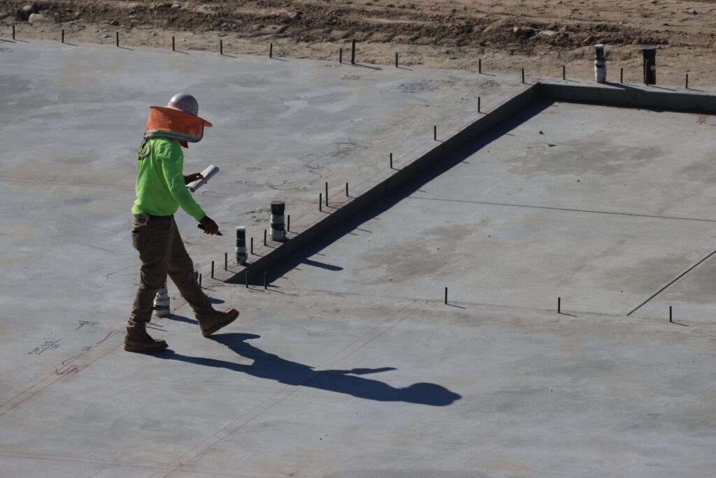 groundworker reviewing licensing documents, USA