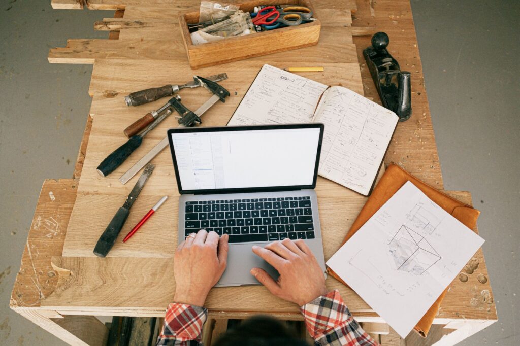A handyman quoting app on a phone screen showing custom line items for a bathroom tile repair with labor and materials costs