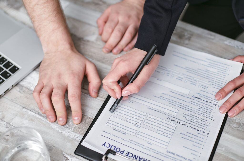 landscaper reviewing insurance documents, USA setting
