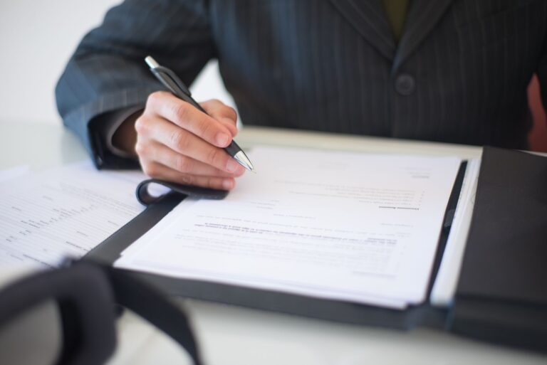 Construction contract document with clear sections highlighted for signing at a US job site