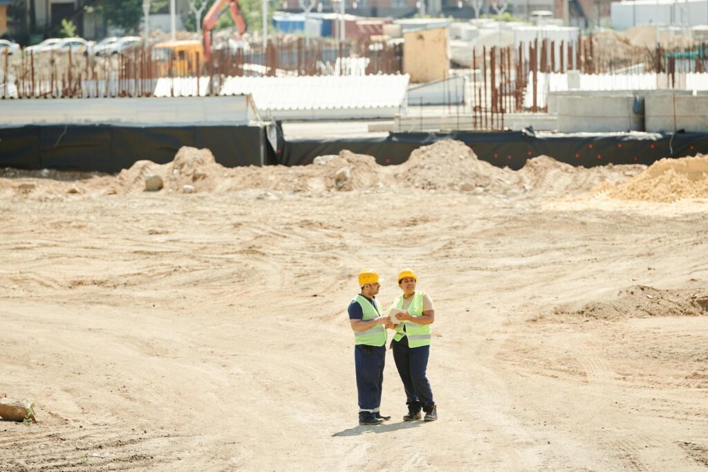 groundworker reviewing insurance documents, USA setting