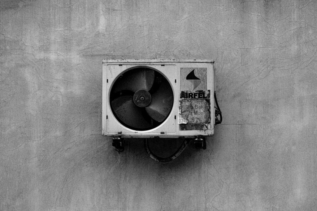 homeowner reviewing HVAC contractors quote on phone USA 2026