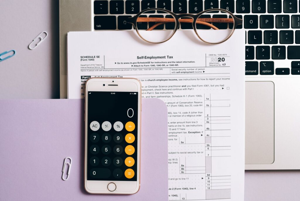 Multiple business apps shown on a phone screen for a contracting business - quoting, accounting, and scheduling